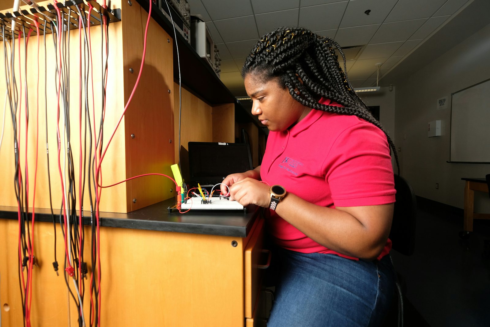 Jackson State University student connecting wires