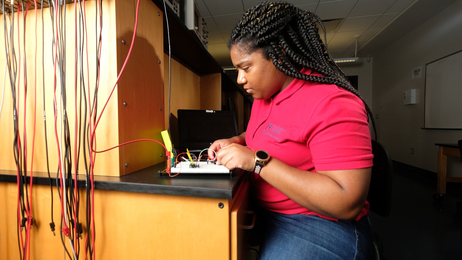 Jackson State University student connecting wires