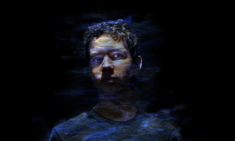 A photo of a teenager with blurry outlines. The edges of blurred with leaking stars from a galaxy.